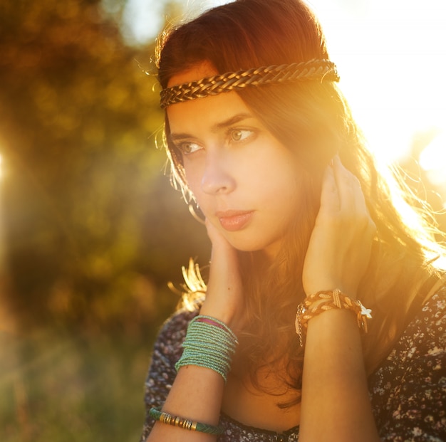 Beautiful hippie girl in the park.