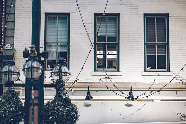 Beautiful historic building with old large windows, outdoor lights in a historic place of Denver city.