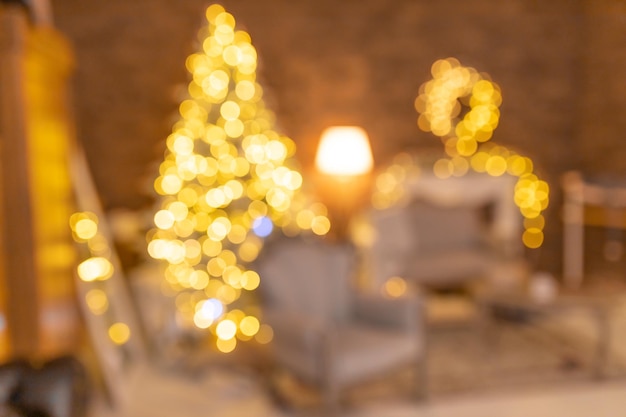 Beautiful holiday decorated room with Christmas tree out of focus Blur christmas background