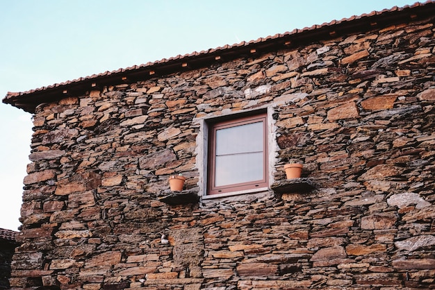 Beautiful house made of old and colourful rocks