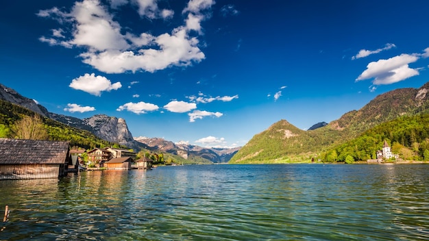 Beautiful houses at the lake in the Alps Europe