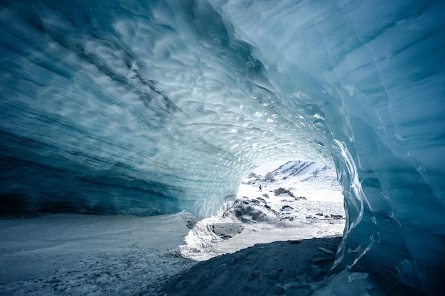 A beautiful ice cave in the Furgg glacier in Zermatt Wallis Switzerland