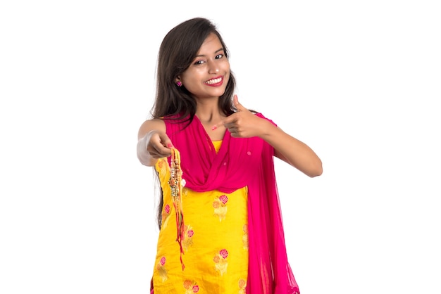 Beautiful Indian girl showing Rakhis on occasion of Raksha bandhan