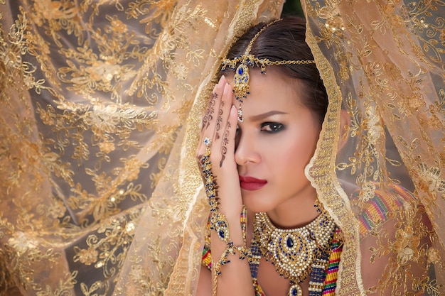  Beautiful indian girl Young hindu woman model with kundan jewelry.