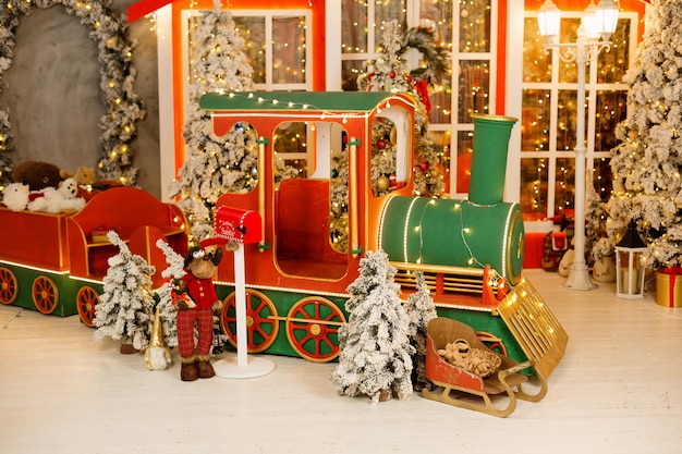 Beautiful interior of living room with decorated Christmas tree