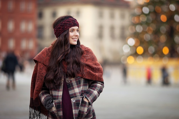 Beautiful joyful woman in the city