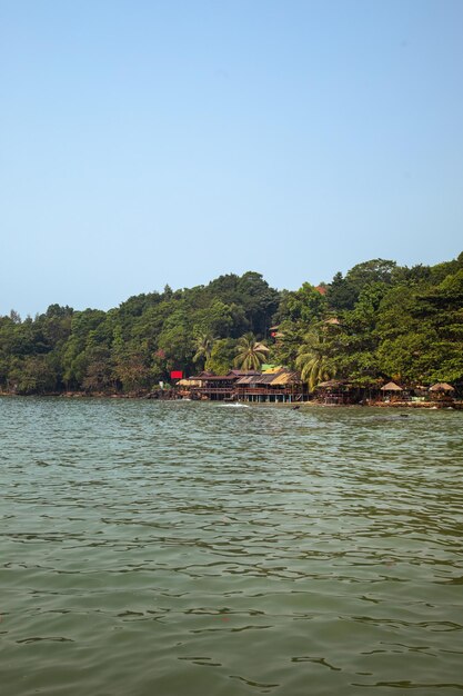 Beautiful Koh Rong island with shabby cafes and old shacks on the beach