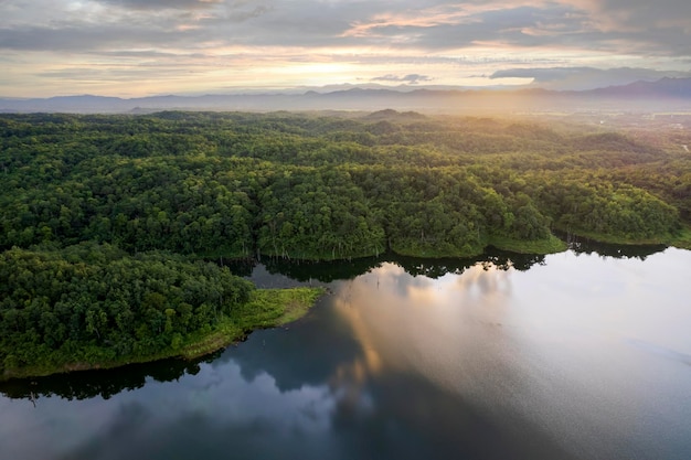 Beautiful lake above the dam among blue sky clouds and mountainslake mountain view