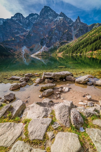 Beautiful lake in the mountains at dawn in autumn