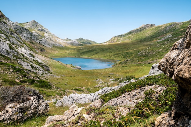 Beautiful lake surrounded by mountains in Somiedo National Park, Asturias.