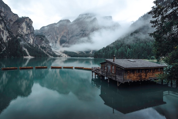 Beautiful lake with boats in the Italian alps, Lago di Braies