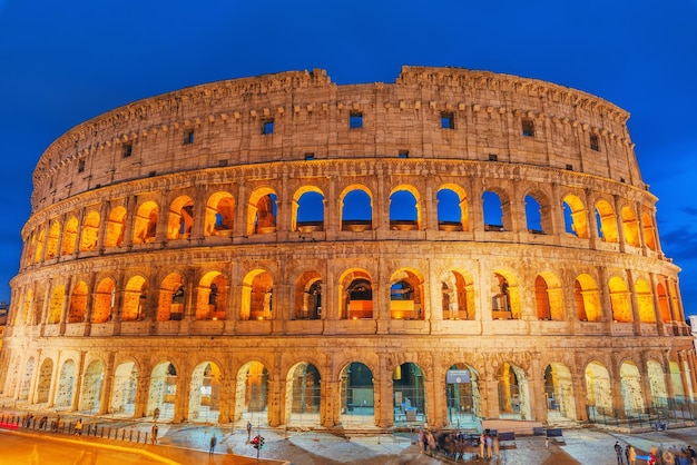 Beautiful landscape of the colosseum in rome one of wonders of the world in the evening time italy