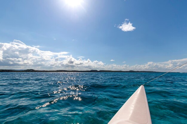 Beautiful landscape from the catamaran to Atlantic ocean and coastline Turquoise water and blue sky with clouds Cuba