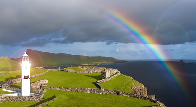 Beautiful landscape of a hill with a rainbow