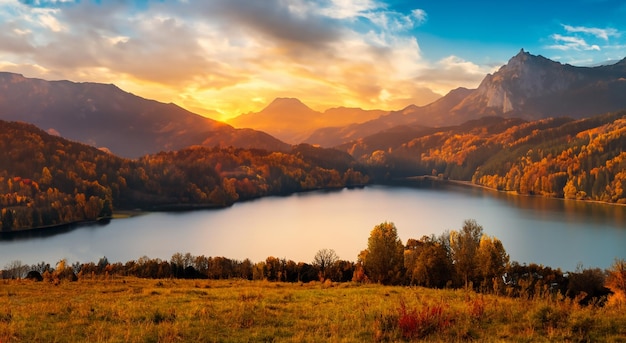 Beautiful landscape of a long in autumn with great mountains in the background