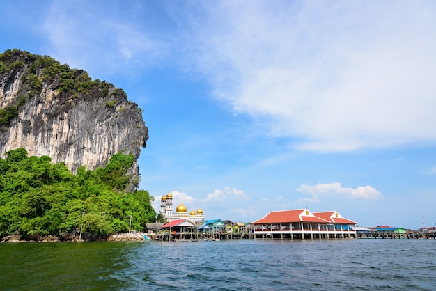 Beautiful landscape mosque sea and sky in summer at Punyi island, Ko Panyi or Koh Panyee, Muslim fisherman village landmark attractions travel by boat at Ao Phang Nga Bay National Park, Thailand, Asia