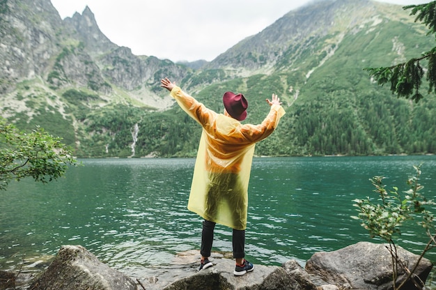 Beautiful landscape of mountain and lake with man