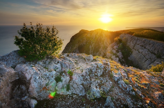 Beautiful landscape. Rock, mountain and sea. Composition of nature.