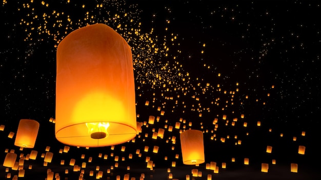 Photo beautiful lanterns flying in night sky