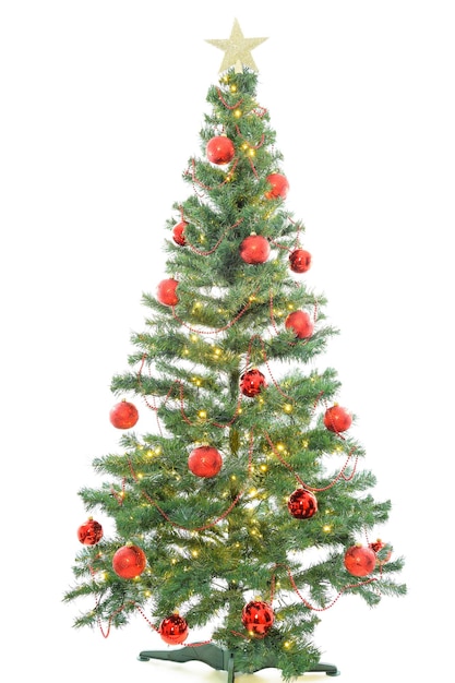 Beautiful large christmas tree with red balls and lights isolated on white background