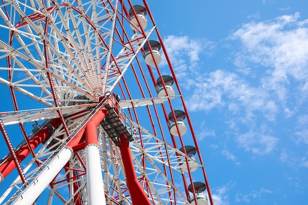 Beautiful large ferris wheel against blue sky low angle view