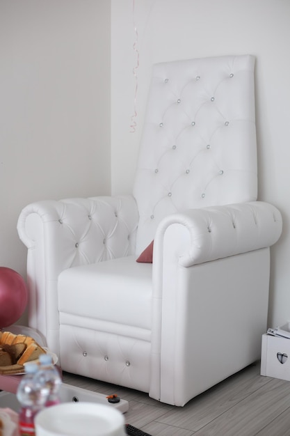 Beautiful large white leather armchair with diamond crystal inserts