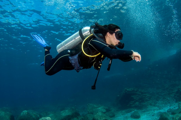 Beautiful latina mexican girl diving in cortez sea