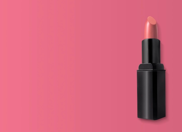 Beautiful lipstick on pink background Makeup product