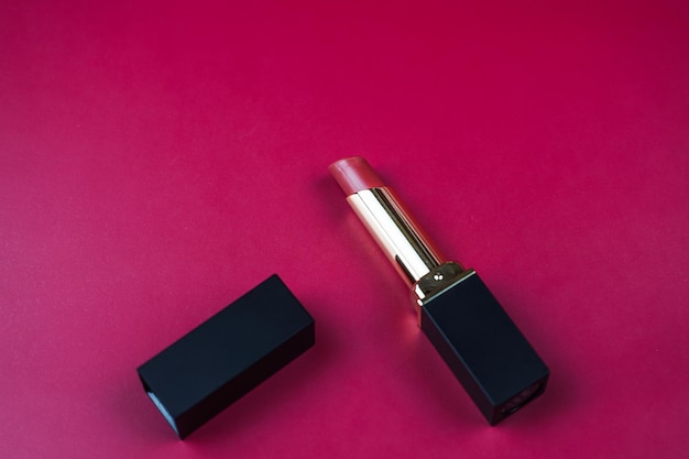 beautiful lipstick on pink background