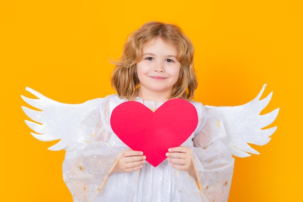 Beautiful little angel isolated studio shot cute pretty child with angel wings cupid valentines day