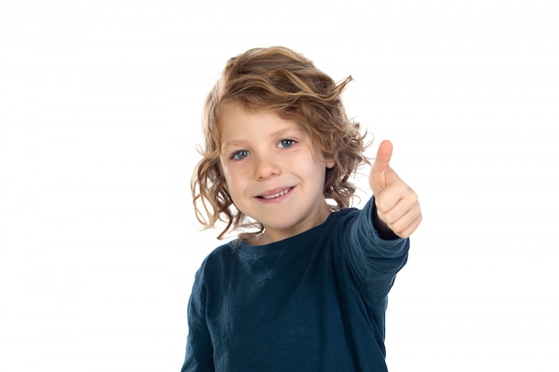 Beautiful little boy with blond long hair