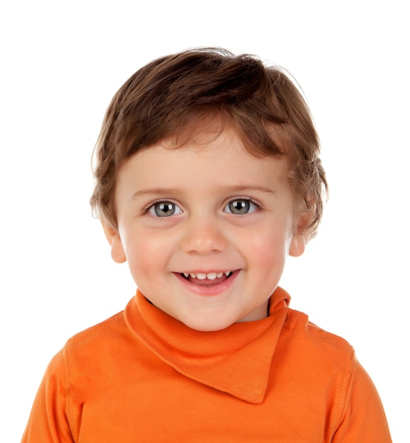 Beautiful little child two years old with orange jersey