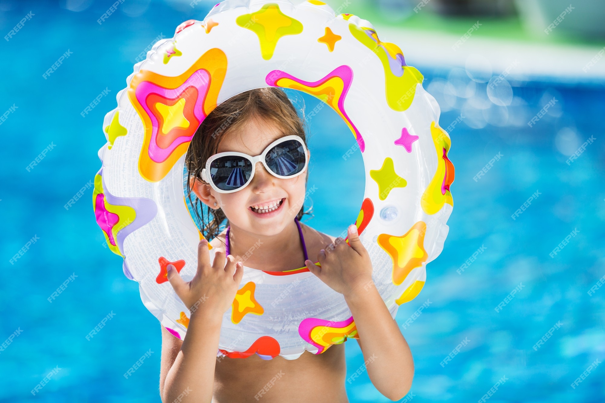 Premium Photo | Beautiful little girl sunning at the pool