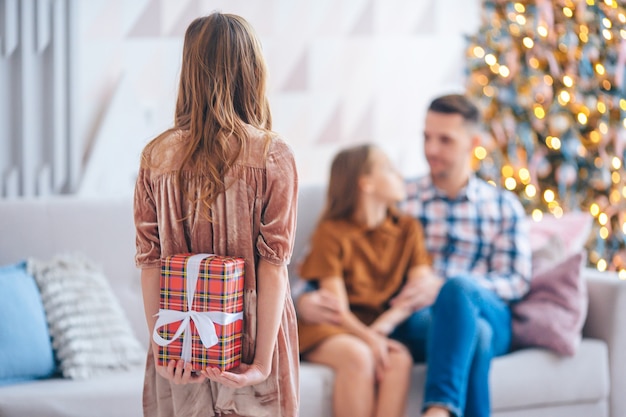 Beautiful little girl with a gift