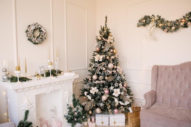 Beautiful living room interior with fireplace and Christmas tree Christmas decor