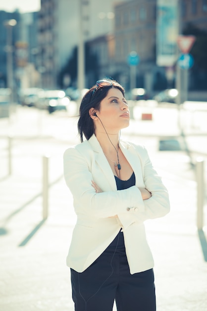 beautiful long black hair elegant business woman with earphones