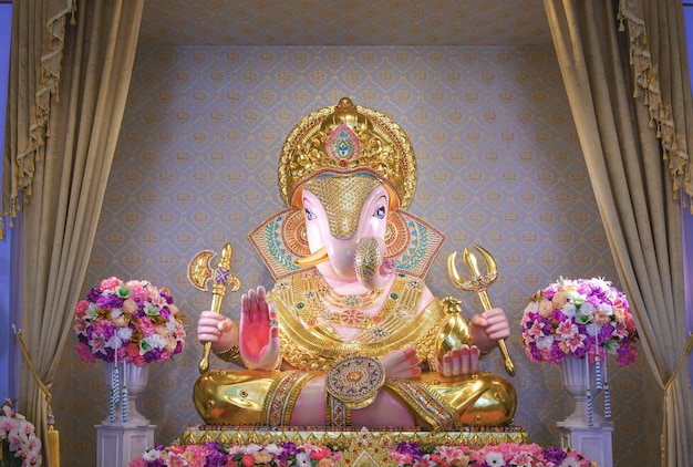 Beautiful Lord Ganesha Dagadusheth statue enshrined in a Hindu temple