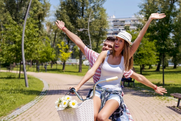 Beautiful lovely couple enjoying picnic day together in the park