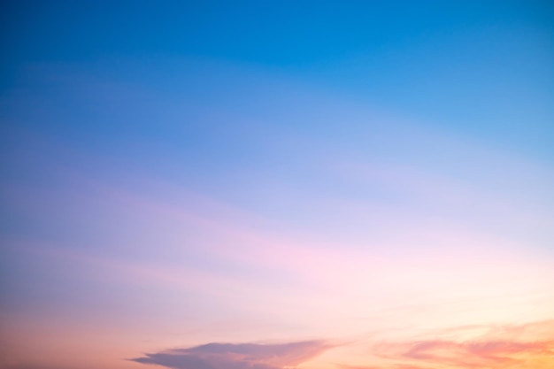 Beautiful of luxury soft gradient orange gold clouds and sunlight on the blue sky perfect for the background take in everningTwilight