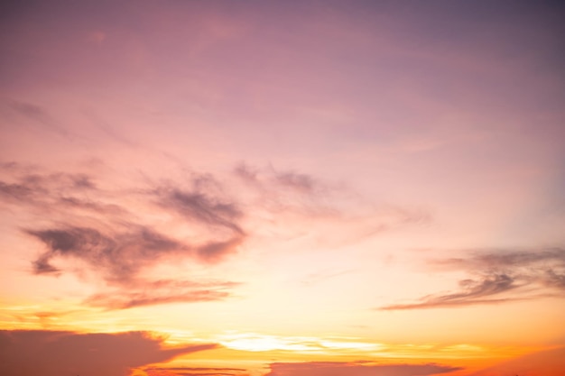 Beautiful luxury soft gradient with orange gold clouds and sunlight on the blue sky perfect for the background take in everningmorningTwilight high definition landscape photo