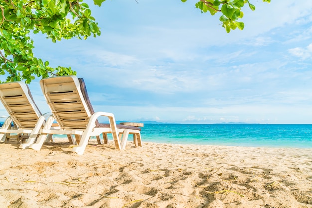 Beautiful luxury umbrella and chair on beach