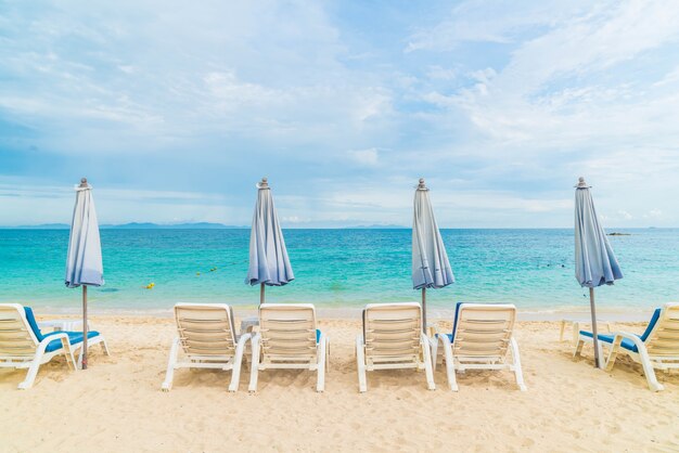 Beautiful luxury umbrella and chair on beach