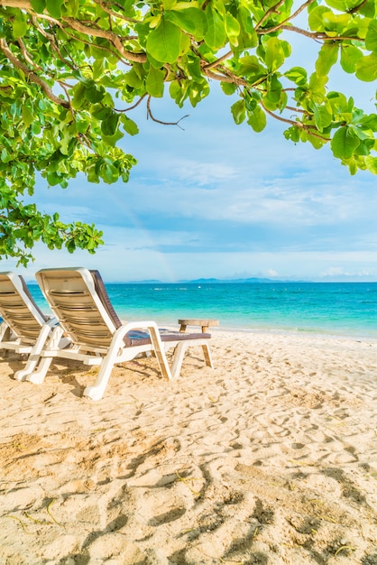 Beautiful luxury umbrella and chair on beach