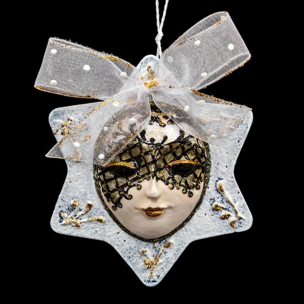 Beautiful mask of handworked for festive decoration isolated