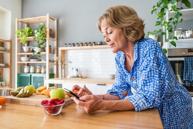 Beautiful mature senior woman at home