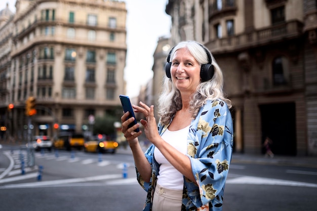 Beautiful mature woman spending time around city