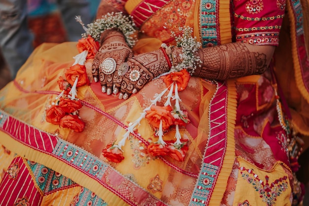 Beautiful Mehndi Henna Design or mehndi tattoos hands of Indian bride
