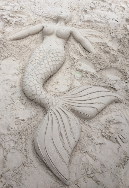 Beautiful mermaid made of fine sand.