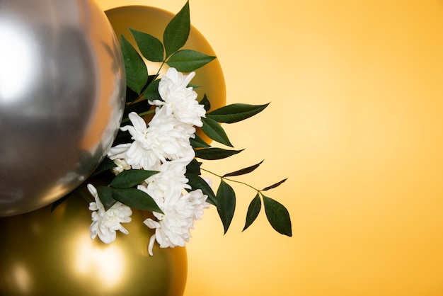 Beautiful metallic balloons with flowers