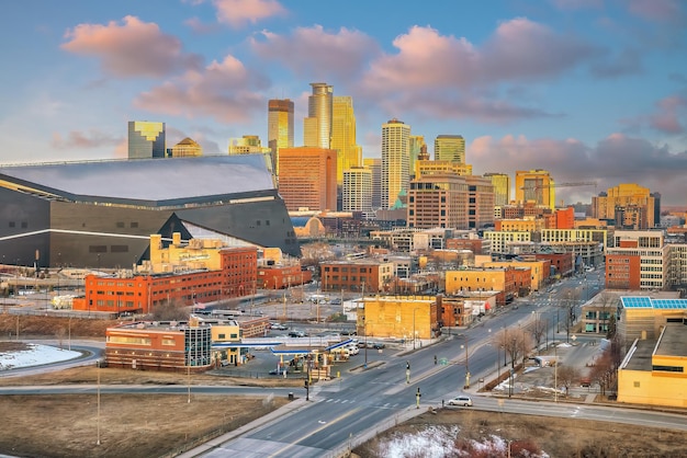 Beautiful Minneapolis downtown city skyline with traffic light at sunset in USA